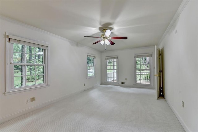 5507 Martina Way, Dunwoody, GA 30338 - empty room with ornamental molding, light carpet, ceiling fan, and baseboards