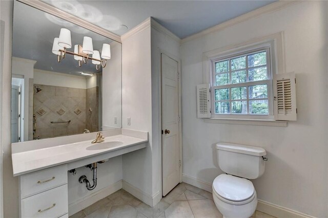 5507 Martina Way, Dunwoody, GA 30338 - bathroom with baseboards, a sink, toilet, crown molding, and a chandelier