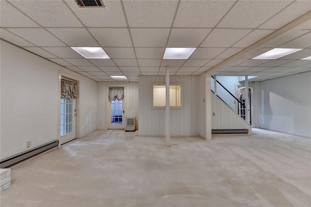 5507 Martina Way, Dunwoody, GA 30338 - spare room featuring a baseboard heating unit, carpet flooring, stairway, and a paneled ceiling