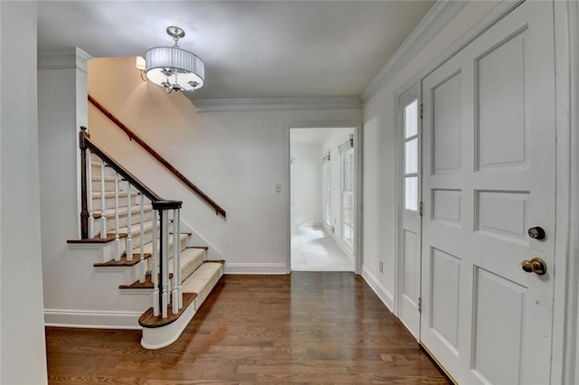5507 Martina Way, Dunwoody, GA 30338 - entryway with wood finished floors, baseboards, crown molding, and stairs