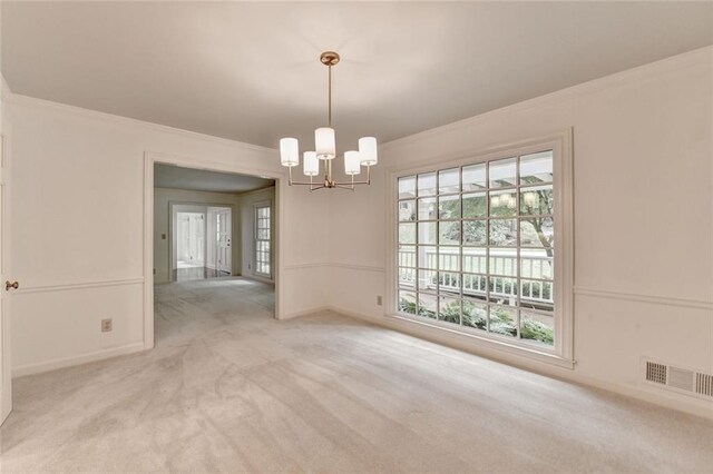 5507 Martina Way, Dunwoody, GA 30338 - empty room featuring ornamental molding, a chandelier, carpet flooring, and baseboards