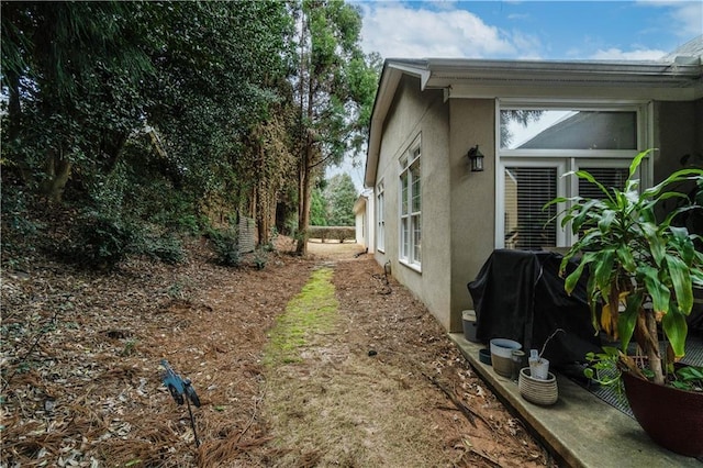 view of home's exterior featuring stucco siding