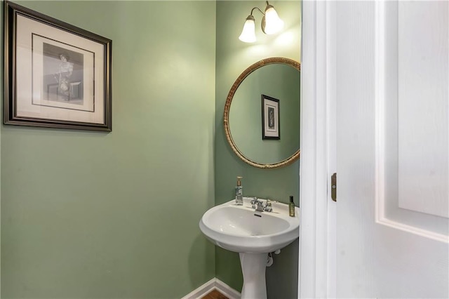 bathroom featuring baseboards