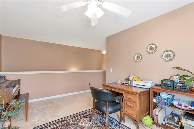 office space with ceiling fan, baseboards, and carpet floors