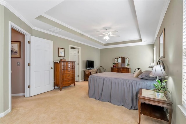 bedroom with visible vents, a raised ceiling, ornamental molding, baseboards, and light colored carpet