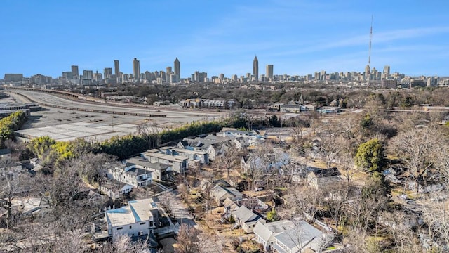 birds eye view of property with a city view