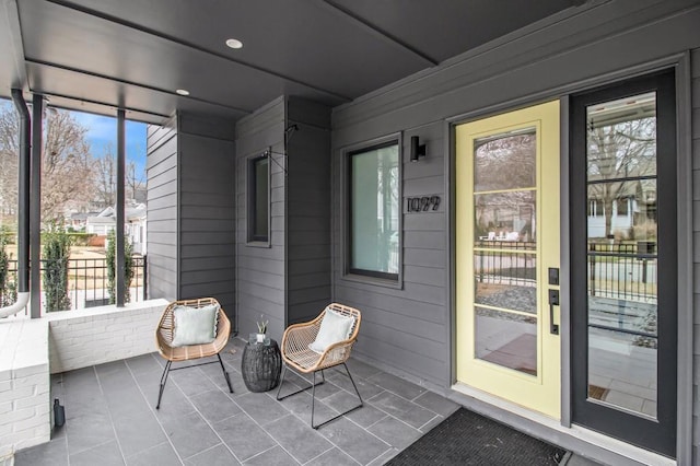 unfurnished sunroom with plenty of natural light