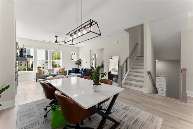 1941 Quarry Park Pl NW, Atlanta, GA 30318 - dining area featuring light wood-style flooring, ceiling fan, and baseboards
