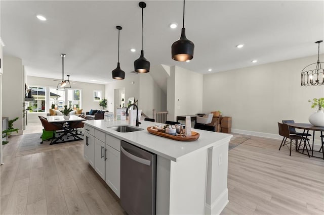 1941 Quarry Park Pl NW, Atlanta, GA 30318 - kitchen featuring a sink, stainless steel dishwasher, open floor plan, light wood finished floors, and recessed lighting