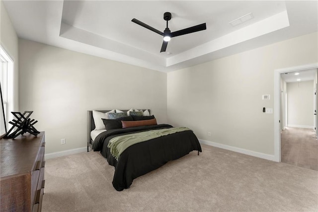 1941 Quarry Park Pl NW, Atlanta, GA 30318 - bedroom with a raised ceiling, carpet, baseboards, and ceiling fan