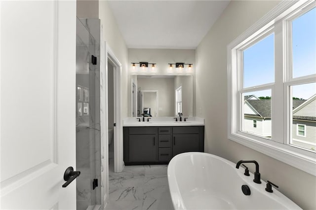 1941 Quarry Park Pl NW, Atlanta, GA 30318 - full bathroom with marble finish flooring, a freestanding tub, double vanity, and a shower stall