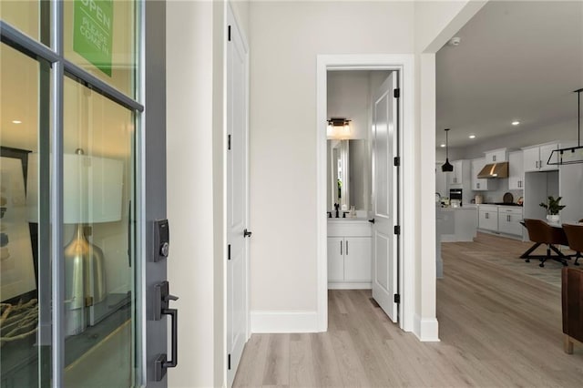 1941 Quarry Park Pl NW, Atlanta, GA 30318 - hallway with light wood-style floors, recessed lighting, and baseboards
