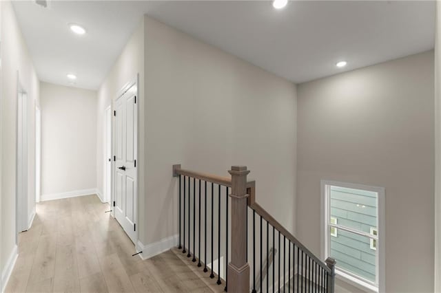 1941 Quarry Park Pl NW, Atlanta, GA 30318 - corridor featuring an upstairs landing, light wood-style flooring, recessed lighting, and baseboards