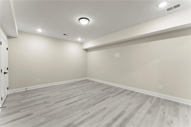 1941 Quarry Park Pl NW, Atlanta, GA 30318 - finished below grade area with baseboards, light wood finished floors, and recessed lighting