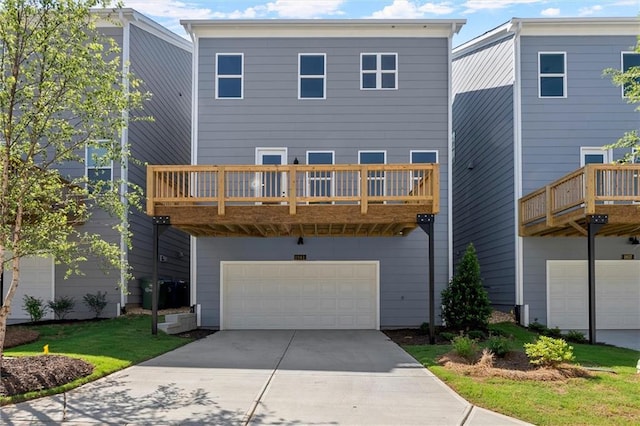 1941 Quarry Park Pl NW, Atlanta, GA 30318 - back of property featuring a garage and concrete driveway