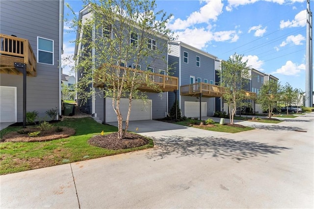 1941 Quarry Park Pl NW, Atlanta, GA 30318 - view of front facade with an attached garage and driveway