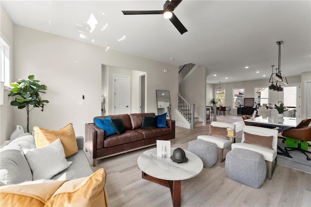 1941 Quarry Park Pl NW, Atlanta, GA 30318 - living area with stairway, light wood-style flooring, a ceiling fan, and recessed lighting