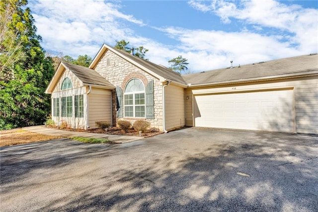 view of property exterior featuring a garage