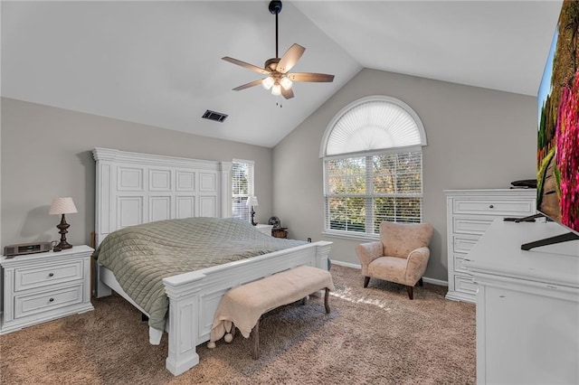 bedroom with multiple windows, lofted ceiling, ceiling fan, and carpet flooring