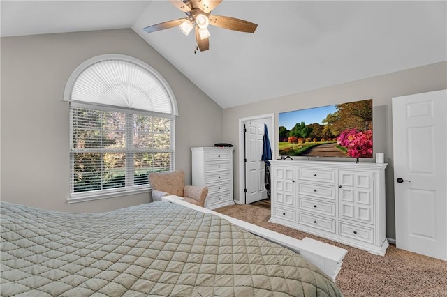 bedroom featuring ceiling fan, lofted ceiling, and carpet floors