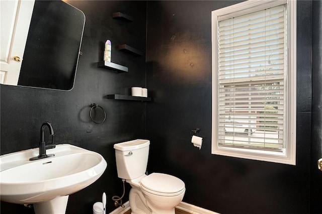 bathroom with toilet and sink