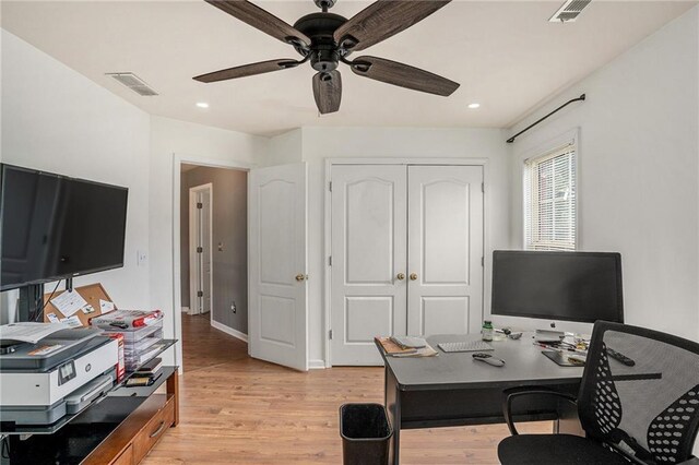 office featuring ceiling fan and light hardwood / wood-style floors