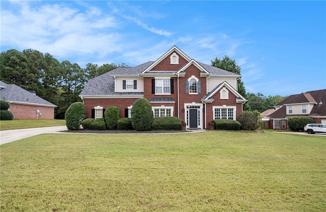 view of front of home with a front lawn