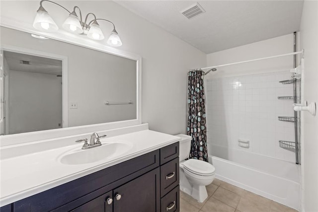 bathroom featuring toilet, tile patterned flooring, vanity, and shower / tub combo