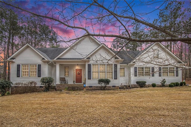 single story home featuring a yard and crawl space