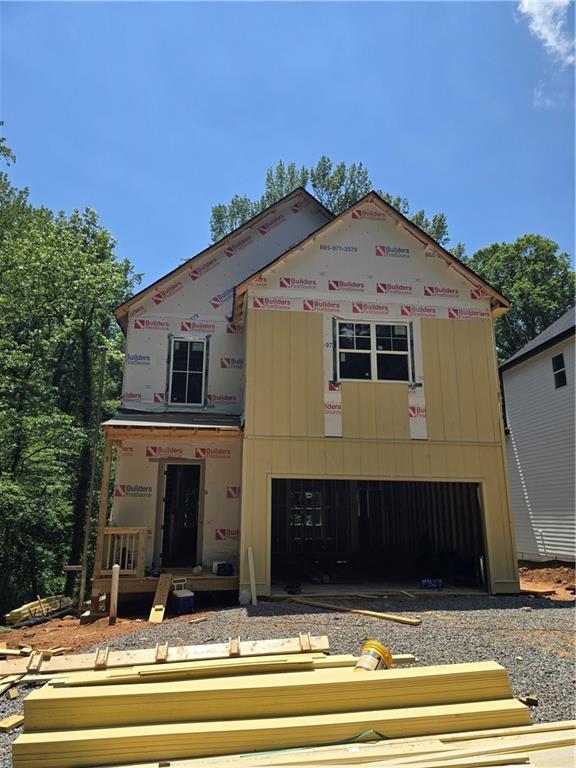 1664 Crestridge Dr SE, Marietta, GA 30067 - property in mid-construction featuring an attached garage