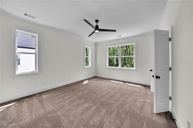 1664 Crestridge Dr SE, Marietta, GA 30067 - spare room featuring carpet, a ceiling fan, baseboards, and ornamental molding