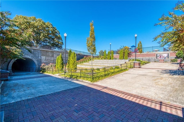 exterior space with street lighting and driveway