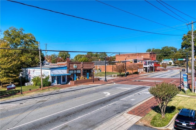 view of road featuring curbs and sidewalks