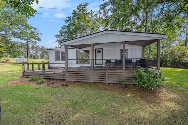 370 David Williams Rd, Sparta, GA 31087 - manufactured / mobile home with a front lawn
