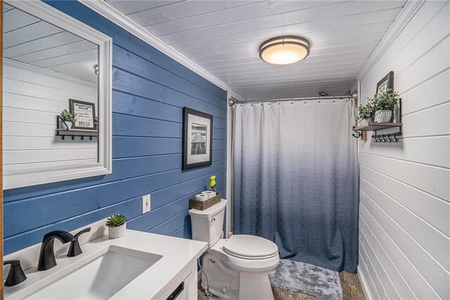 370 David Williams Rd, Sparta, GA 31087 - full bath featuring vanity, ornamental molding, curtained shower, toilet, and wooden walls