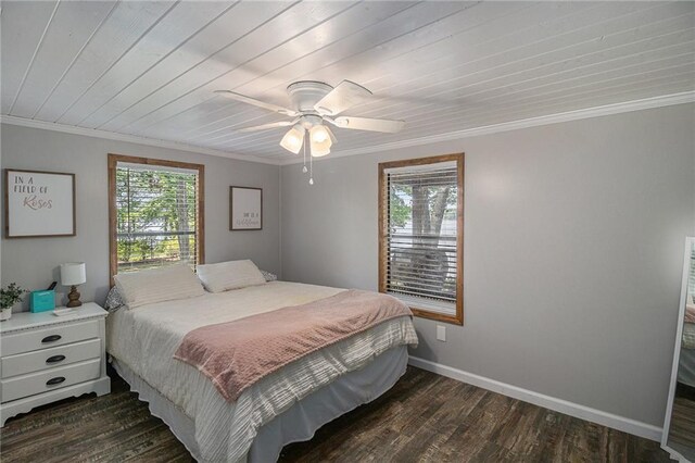 370 David Williams Rd, Sparta, GA 31087 - bedroom featuring crown molding, dark wood finished floors, and multiple windows