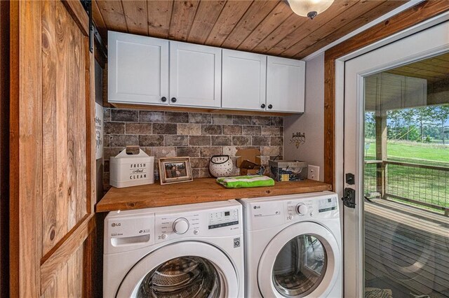370 David Williams Rd, Sparta, GA 31087 - clothes washing area featuring wood ceiling, cabinet space, and washer and clothes dryer