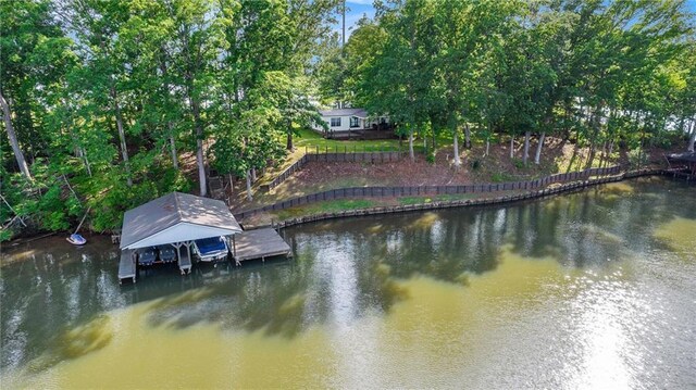 370 David Williams Rd, Sparta, GA 31087 - dock area featuring a water view, fence, and boat lift