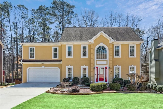 view of front facade featuring a front yard, roof with shingles, driveway, stucco siding, and a garage