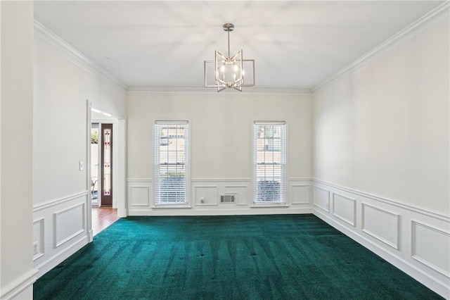 empty room featuring a wainscoted wall, crown molding, visible vents, and a chandelier