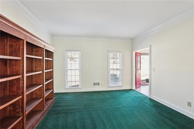 carpeted empty room with visible vents, baseboards, and crown molding