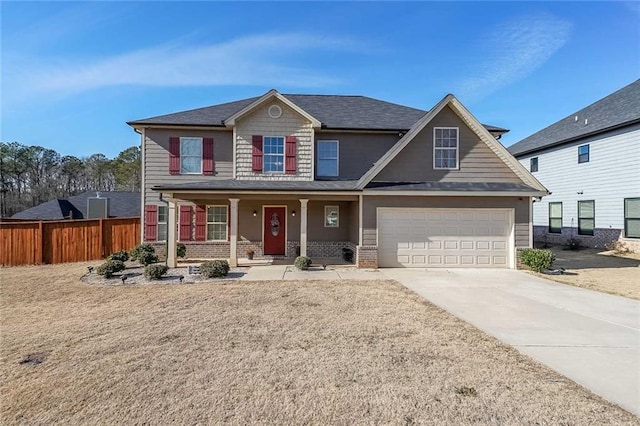 view of front of home featuring a garage and covered porch