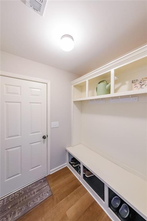 mudroom featuring wood-type flooring