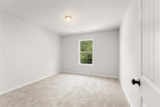 spare room with carpet floors