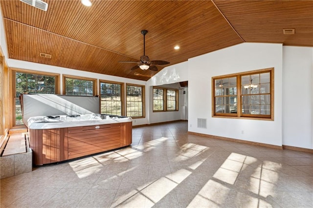 sunroom with vaulted ceiling, ceiling fan, and wood ceiling