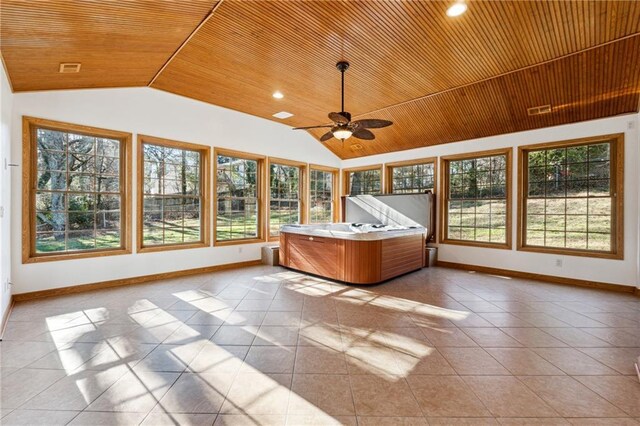 unfurnished sunroom with vaulted ceiling, ceiling fan, and wooden ceiling