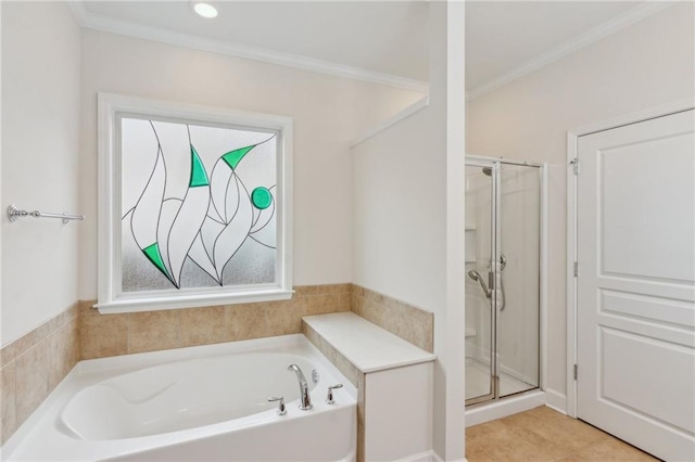 full bathroom featuring a garden tub, ornamental molding, a shower stall, and tile patterned flooring