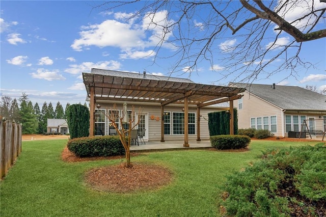 rear view of house featuring a patio area, fence, a lawn, and a pergola