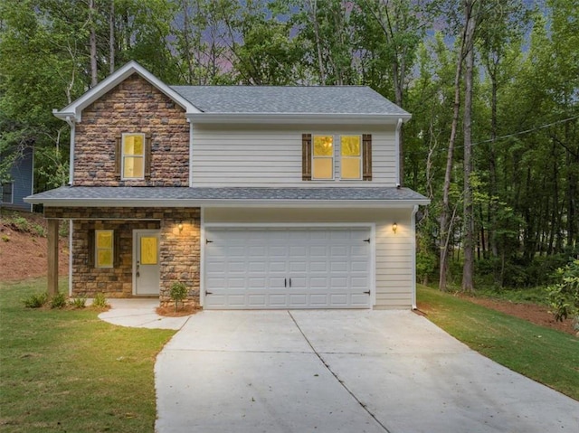 traditional home featuring a front yard, stone siding, a shingled roof, an attached garage, and driveway