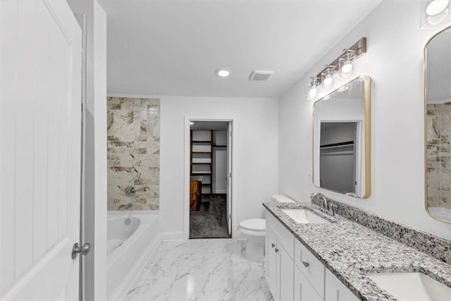 full bathroom featuring a tub, double vanity, a sink, toilet, and marble finish floor